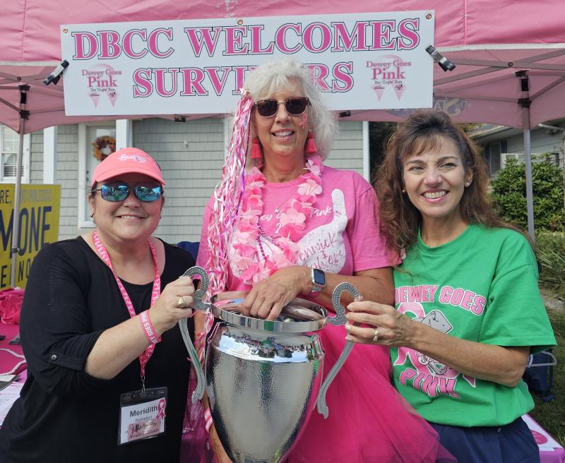 Delaware Breast Cancer Coalition team members welcoming 2024 Dewey Goes Pink participants are (l-r) Meridith Rothstein, survivorship specialist; Linda Marquess, board vice president; and Francesca Vogel, CEO. SUBMITTED PHOTO